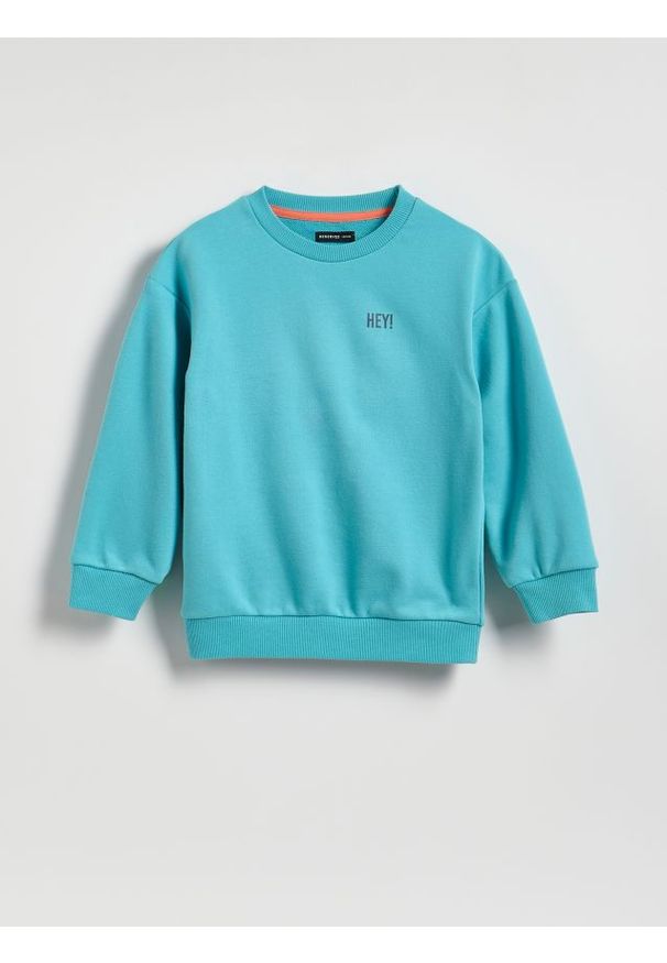Reserved - Bluza z nadrukiem - jasnoturkusowy. Kolor: turkusowy. Materiał: dzianina, bawełna. Wzór: nadruk