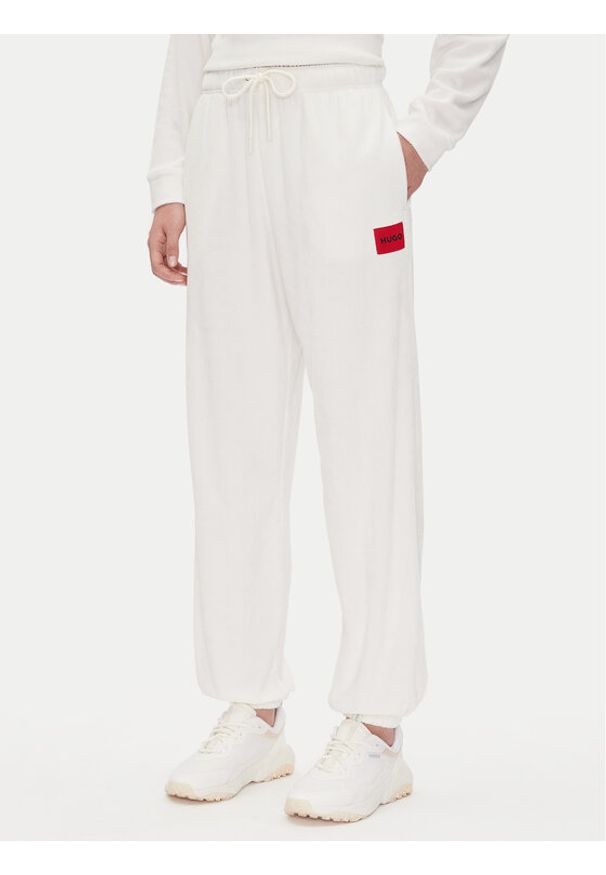 Hugo - HUGO Spodnie dresowe Neve_Pants 50531692 Écru Relaxed Fit. Materiał: bawełna, syntetyk