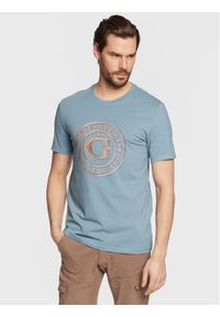 Guess T-Shirt Round Logo M3GI11 J1314 Niebieski Slim Fit. Kolor: niebieski. Materiał: bawełna