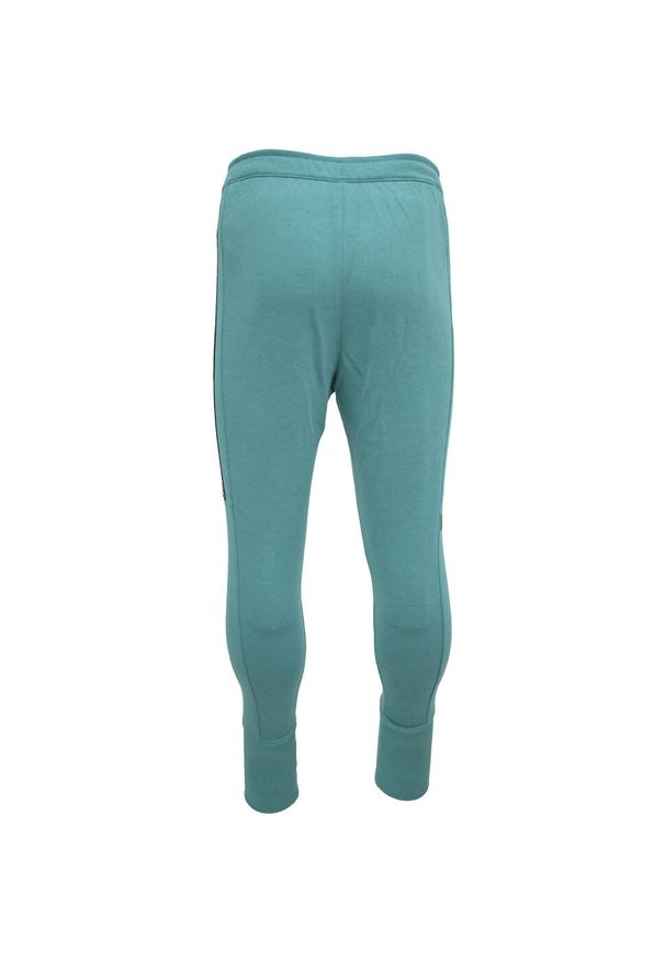 Spodnie Under Armour Accelerate Off-Pitch, Mężczyźni. Kolor: zielony