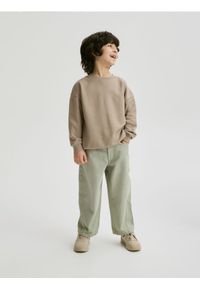 Reserved - Bawełniane spodnie - jasnozielony. Kolor: zielony. Materiał: bawełna