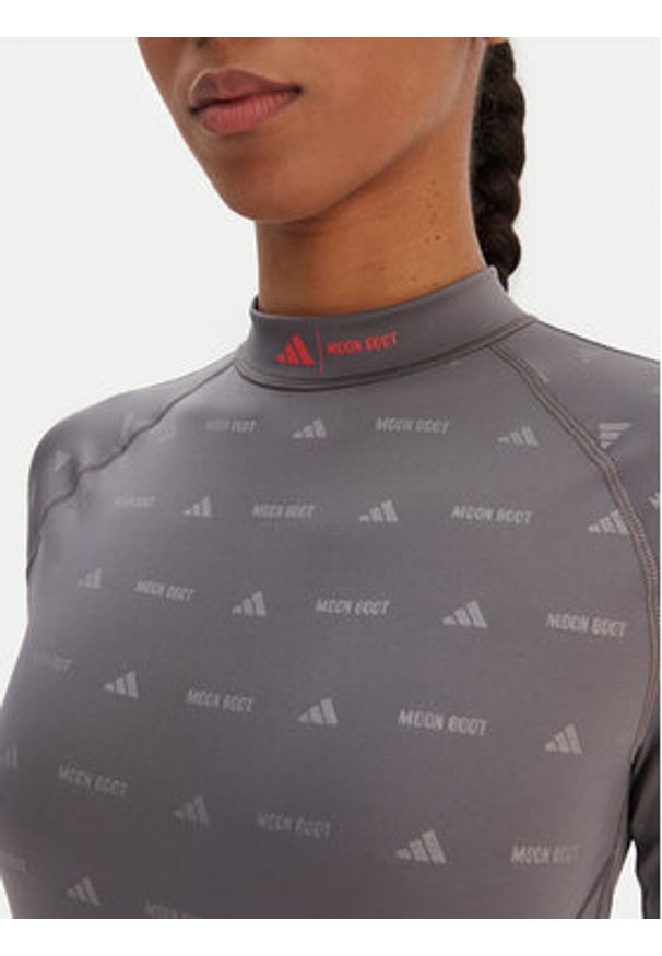 Adidas - adidas Kombinezon Moon Boot Shine KB5133 Szary Slim Fit. Kolor: szary. Materiał: syntetyk