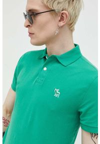 Abercrombie & Fitch polo męski kolor zielony z aplikacją. Typ kołnierza: polo. Kolor: zielony. Materiał: skóra, dzianina, materiał. Długość: krótkie. Wzór: aplikacja #5