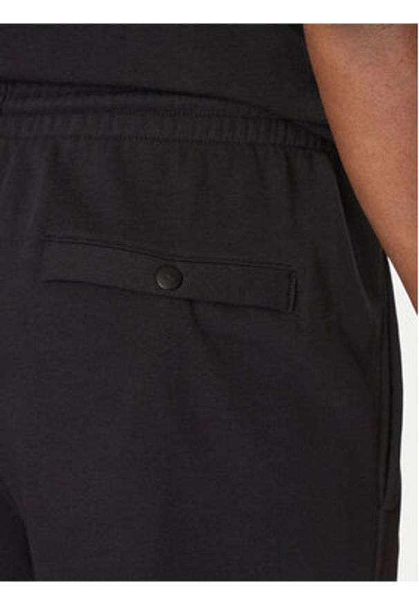 Reebok Spodnie dresowe 100214075 Czarny Regular Fit. Kolor: czarny. Materiał: bawełna