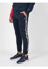 Champion Spodnie "Sweat Pants" | 216561 | Mężczyzna | Granatowy. Okazja: na co dzień. Kolor: niebieski. Materiał: bawełna, poliester. Wzór: nadruk. Styl: casual #6