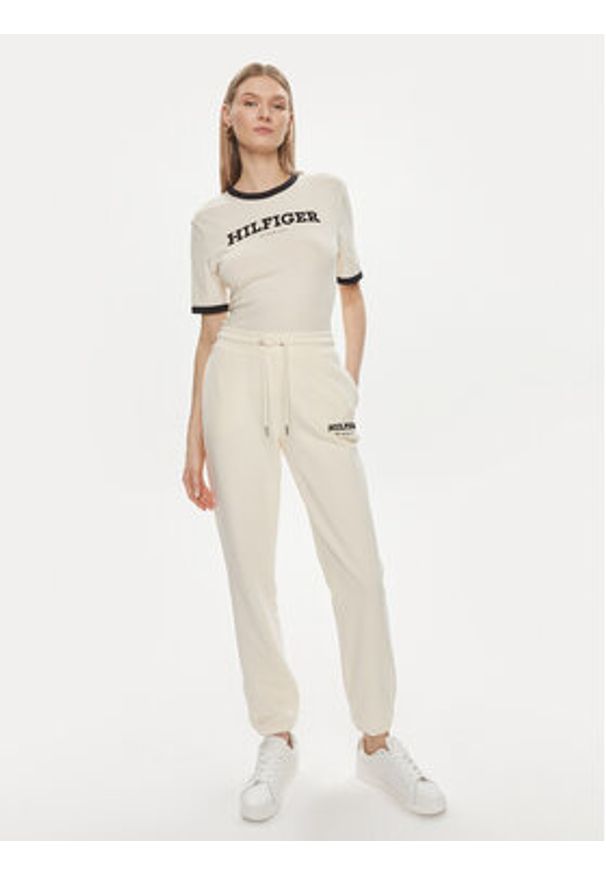 TOMMY HILFIGER - Tommy Hilfiger Spodnie dresowe Monotype WW0WW41572 Beżowy Regular Fit. Kolor: beżowy. Materiał: bawełna