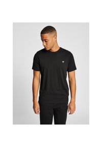 Hummel - HUMMEL bluzka bawełniana hmlIC FRED T-SHIRT. Kolor: czarny. Materiał: bawełna. Sport: piłka nożna #1
