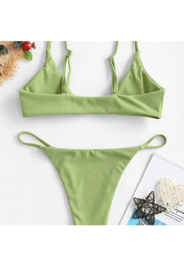 Intica - Bikini z ozdobnymi kółeczkami regulowane na lato Mareike. Kolor: czarny. Materiał: materiał