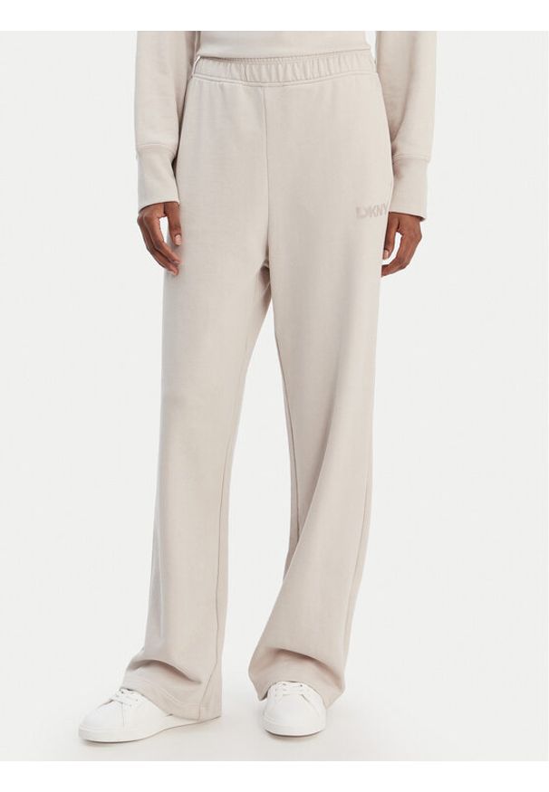 DKNY Sport Spodnie dresowe DP6P3795 Beżowy Regular Fit. Kolor: beżowy. Materiał: bawełna
