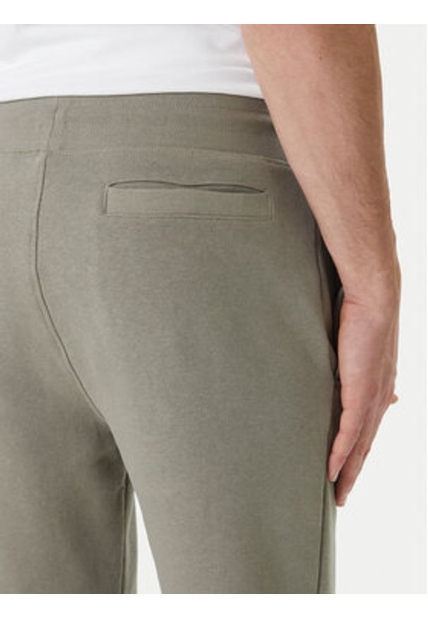 Guess Spodnie dresowe Z2YB22 KAIJ1 Zielony Regular Fit. Kolor: zielony. Materiał: bawełna