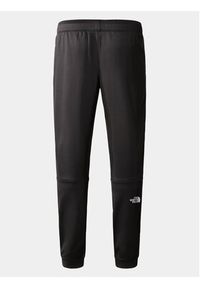 The North Face Spodnie dresowe Reaxion NF0A7Z9P Czarny Regular Fit. Kolor: czarny. Materiał: syntetyk #6