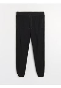 Sinsay - Strukturalne spodnie regular fit - czarny. Kolor: czarny