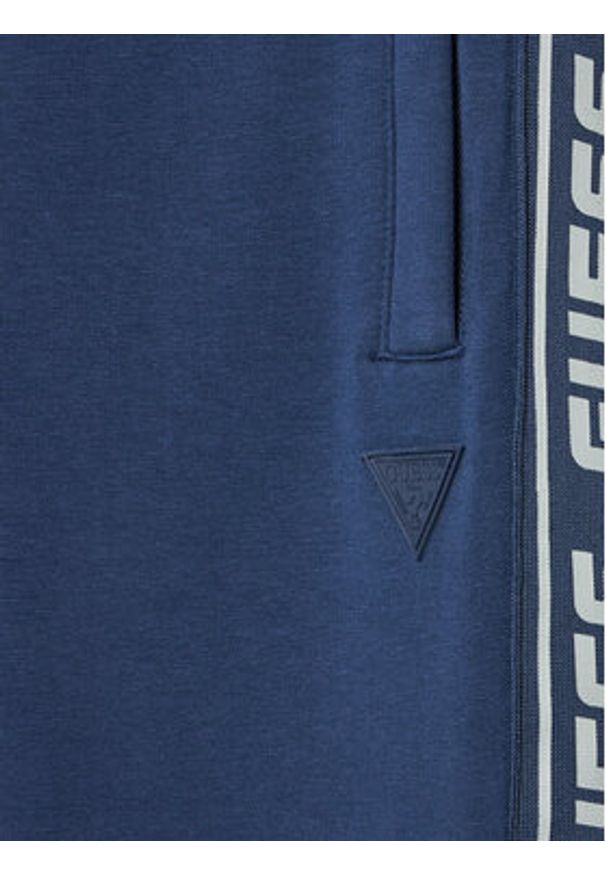 Guess Spodnie dresowe Z2YB19 K6ZS1 Granatowy Regular Fit. Kolor: niebieski. Materiał: bawełna