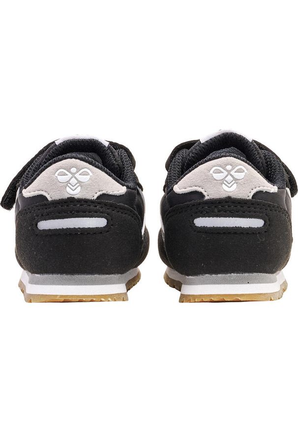 Trenerzy dla dzieci Hummel Reflex. Zapięcie: rzepy. Kolor: czarny. Materiał: guma. Wzór: aplikacja