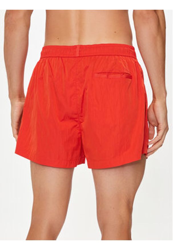 Calvin Klein Swimwear Szorty kąpielowe KM0KM01048 Czerwony Regular Fit. Kolor: czerwony. Materiał: syntetyk