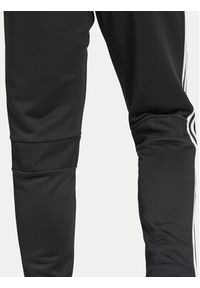 Adidas - adidas Spodnie dresowe Tiro 25 Essentials Sweat JC5464 Czarny Regular Fit. Kolor: czarny. Materiał: syntetyk #3