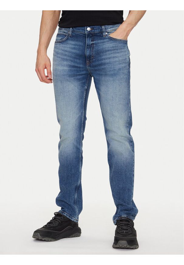Hugo - HUGO Jeansy 50537698 Niebieski Slim Fit. Kolor: niebieski