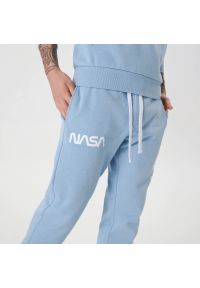 Sinsay - Spodnie jogger NASA - Niebieski. Kolor: niebieski