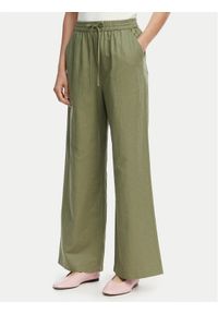 Tommy Jeans Spodnie materiałowe DW0DW22285 Zielony Loose Fit. Kolor: zielony. Materiał: len #1