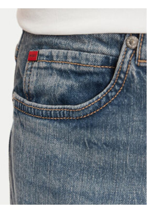 Hugo - HUGO Jeansy 50537705 Niebieski Tapered Fit. Kolor: niebieski