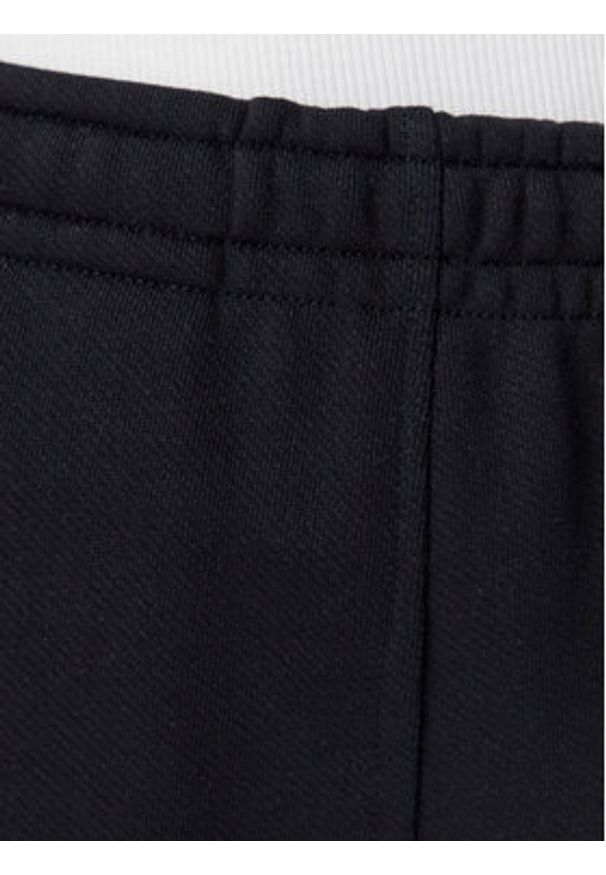 Tommy Jeans Spodnie dresowe Badge DW0DW20679 Czarny Regular Fit. Kolor: czarny. Materiał: bawełna
