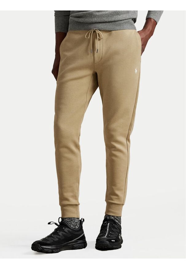 Polo Ralph Lauren Spodnie dresowe 710881518082 Beżowy Regular Fit. Kolor: beżowy. Materiał: bawełna