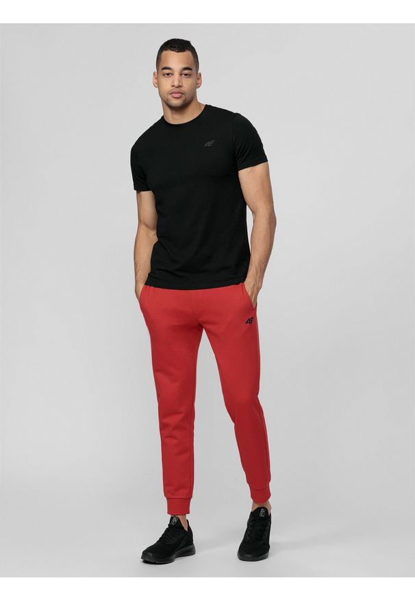 4f - Spodnie dresowe joggery męskie. Kolor: czerwony. Materiał: dresówka
