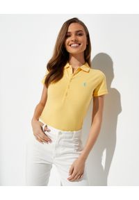 Ralph Lauren - RALPH LAUREN - Bawełniana koszulka polo Slim Fit Stretch z logo. Typ kołnierza: polo. Kolor: żółty. Materiał: bawełna. Wzór: haft. Styl: klasyczny