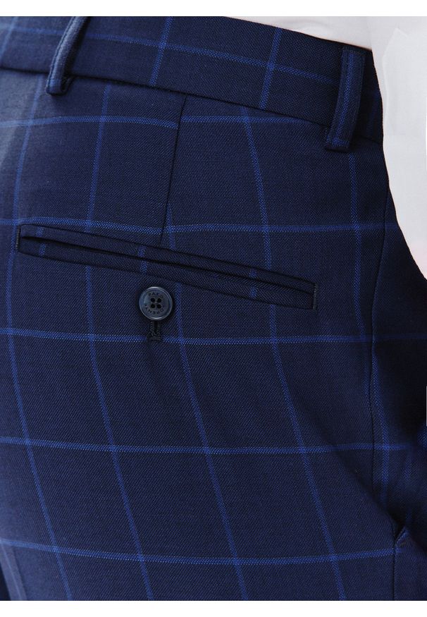 Pako Lorente - PAKO LORENTE – Granatowe spodnie garniturowe w niebieską kratkę. Kolor: niebieski. Materiał: poliester, wełna, lycra. Wzór: kratka
