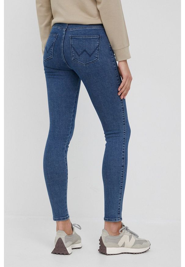 Wrangler jeansy HIGH RISE SKINNY INDIGO SEA damskie high waist. Stan: podwyższony. Kolor: niebieski