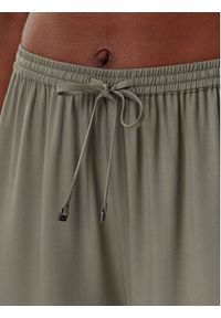 Calvin Klein Swimwear Spodnie materiałowe KW0KW02823 Zielony Relaxed Fit. Kolor: zielony. Materiał: wiskoza #2