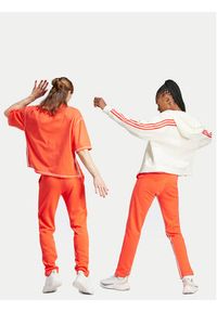Adidas - adidas Spodnie dresowe Dance All-Gender Versatile IS0897 Pomarańczowy Regular Fit. Kolor: pomarańczowy. Materiał: bawełna #4