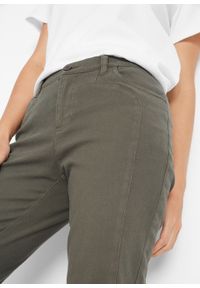 Spodnie wyszczuplające 7/8 bonprix ciemnooliwkowy. Kolor: zielony. Materiał: elastan, materiał, bawełna #2