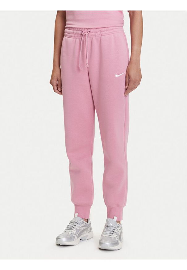 Nike Spodnie dresowe Sportswear Phoenix Fleece FZ7626 Różowy Regular Fit. Kolor: różowy. Materiał: bawełna