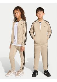 Adidas - adidas Spodnie dresowe adicolor SST KE2864 Beżowy Regular Fit. Kolor: beżowy. Materiał: syntetyk #7
