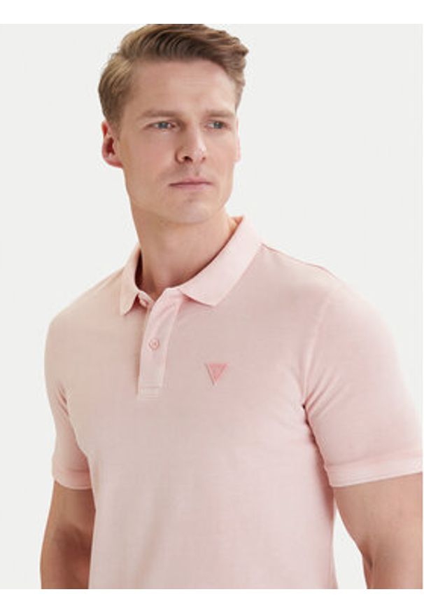 Guess Polo F6GP03 K9WF1 Pomarańczowy Slim Fit. Typ kołnierza: polo. Kolor: pomarańczowy. Materiał: bawełna