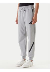 Adidas - adidas Spodnie dresowe Z.N.E. JD9586 Szary Regular Fit. Kolor: szary. Materiał: syntetyk