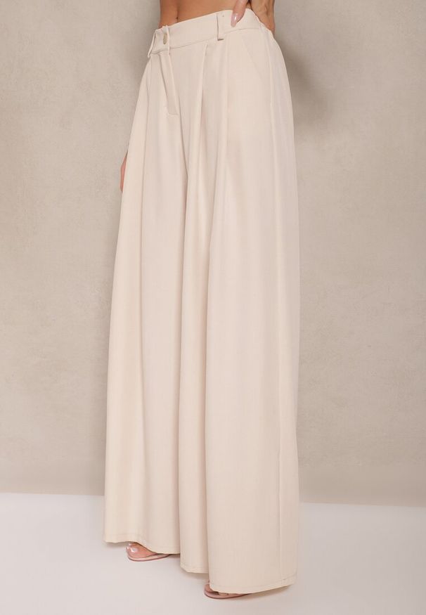 Renee - Beżowe Spodnie Garniturowe o Szerokim Kroju High Waist Peavelle. Stan: podwyższony. Kolor: beżowy. Styl: klasyczny, elegancki