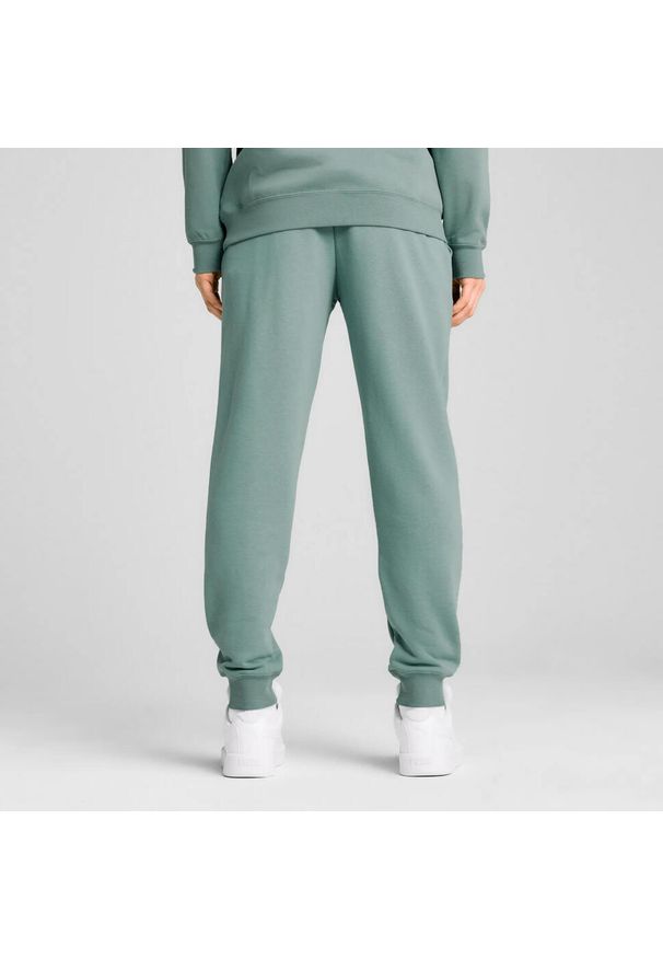 Puma - Spodnie męskie PUMA ESS No. 1 Logo Sweatpants TR CL. Kolor: zielony. Materiał: dresówka