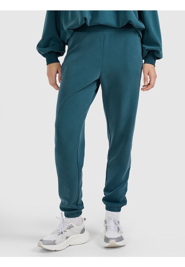 4f - 4F Spodnie dresowe joggery z modalem damskie - turkusowe XXL. Kolor: turkusowy. Materiał: dresówka. Wzór: gładki