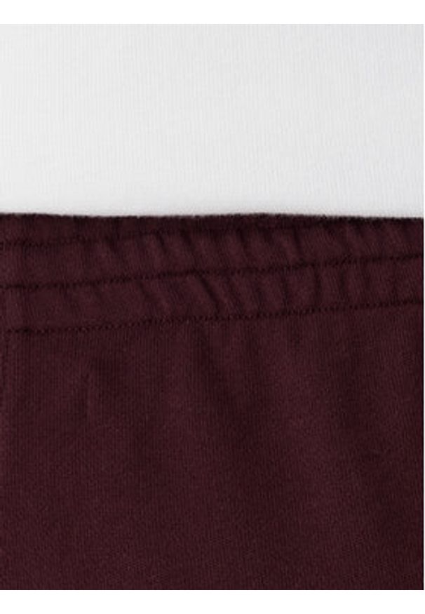 TOMMY HILFIGER - Tommy Hilfiger Spodnie dresowe UW0UW06081 Bordowy Wide Leg. Kolor: czerwony. Materiał: bawełna