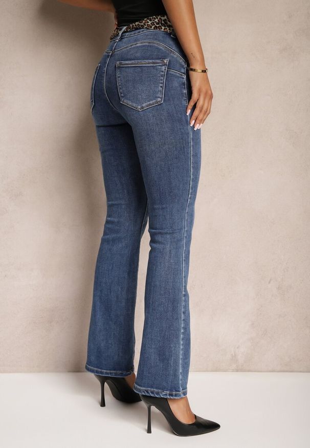 Renee - Niebieskie Jeansy Dzwony z Bawełny Ozdobione Paskiem Terilan. Okazja: na co dzień. Kolor: niebieski. Wzór: aplikacja. Styl: retro, elegancki, casual