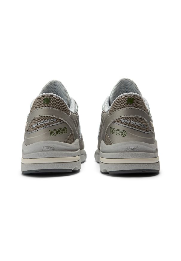 Buty dziecięce New Balance GC1000NK – złote. Kolor: złoty. Materiał: syntetyk, materiał. Szerokość cholewki: normalna