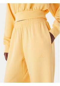 Adidas - adidas Spodnie dresowe Soft Lux KA7020 Pomarańczowy Loose Fit. Kolor: pomarańczowy. Materiał: syntetyk #3