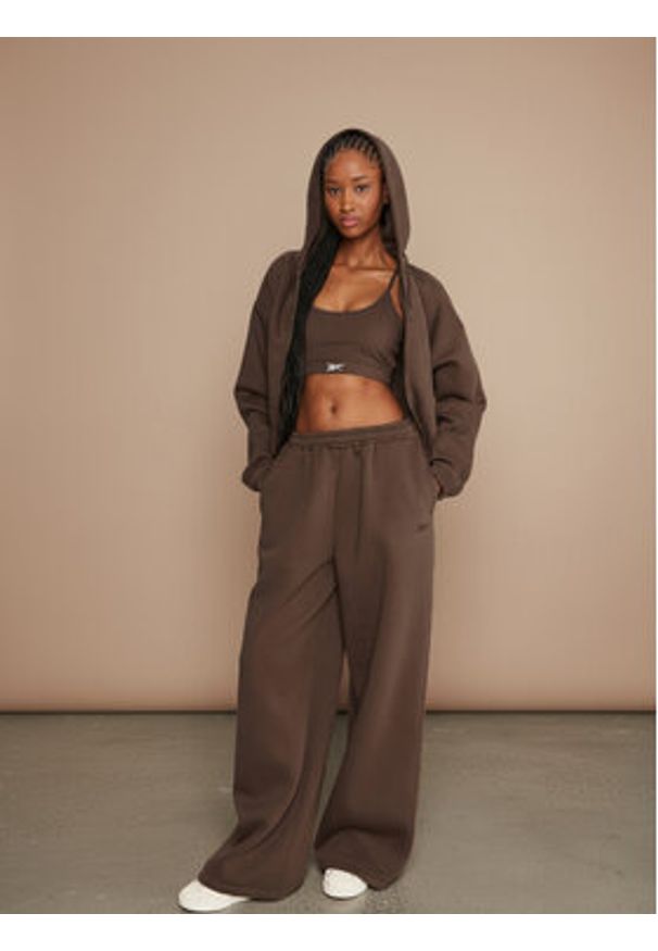 Reebok Spodnie dresowe Reebok X Ewa Chodakowska RK25306CCW Brązowy Regular Fit. Kolor: brązowy. Materiał: syntetyk