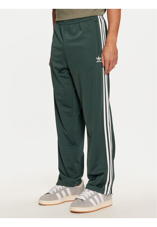 Adidas - adidas Spodnie dresowe adicolor Classics Firebird IY9899 Zielony Regular Fit. Kolor: zielony. Materiał: syntetyk