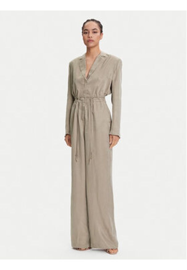Guess Kombinezon W5YD14 WH5N2 Beżowy Regular Fit. Kolor: beżowy. Materiał: syntetyk