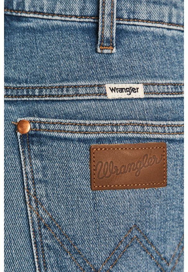 Wrangler - Jeansy Wild West 603. Kolor: niebieski