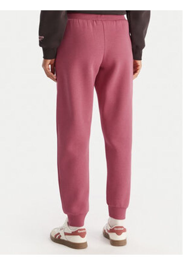 Reebok Spodnie dresowe Erika RK25164CCW Różowy Regular Fit. Kolor: różowy. Materiał: bawełna