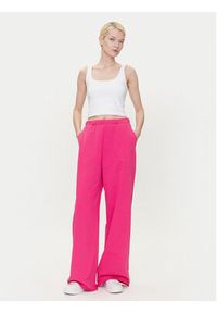 Hugo - HUGO Spodnie dresowe Nasuede_4 50541179 Różowy Relaxed Fit. Kolor: różowy. Materiał: bawełna